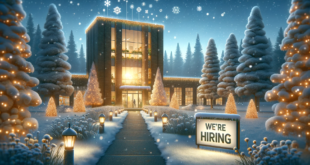 The image should depict a peaceful winter landscape with a pathway leading to a warmly lit, inviting office building surrounded by snow-dusted trees. A 'We're Hiring' sign is prominently displayed and illuminated by a spotlight in front of the office, standing out in the twilight adorned with stars. The atmosphere should be welcoming and optimistic, hinting at the opportunities the holiday season brings for companies to attract top talent. Snowflakes subtly overlay the scene, enhancing the seasonal feel.