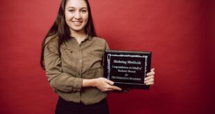 A Businesswoman Receiving a Recognition Award