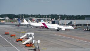 Airplanes Lined Up at Hamburg Airport Terminal