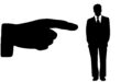 Black and white large hand pointing to black and white silhouette