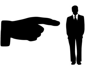 Black and white large hand pointing to black and white silhouette